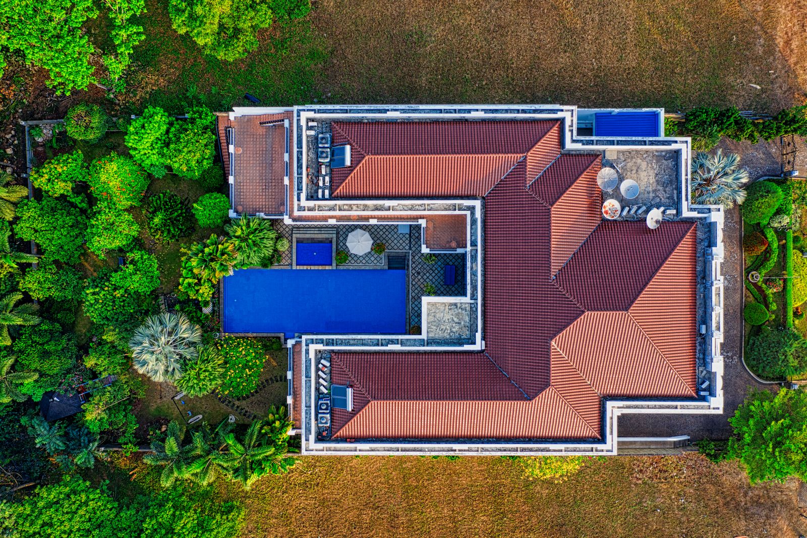 Top-down stock photograph of a roof used as a visual reference for an illustrative takeoff overlay